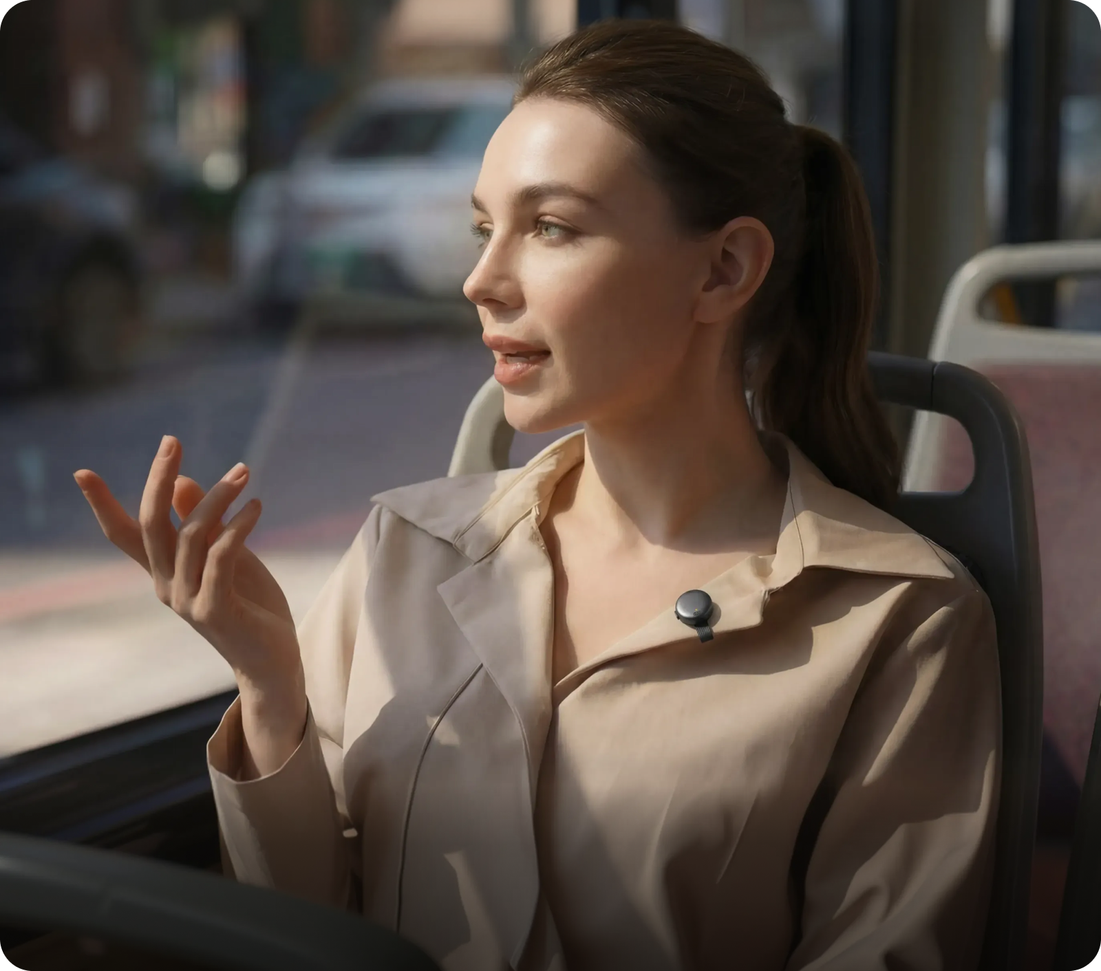 Professional using a wearable AI recorder while working